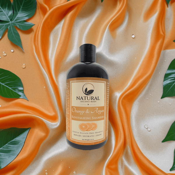 bottle of all natural orange scented shampoo for silky smooth hair plant based shampoo for all hair types
